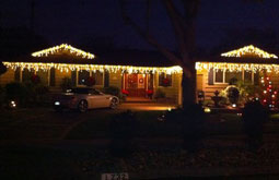 Residential house with christmas icecicle lights San Jose Bay Area Themes